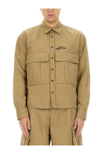 Dsquared2 men’s icon ripstop shirt brown featuring a tan utility jacket with two front flap pockets and a black logo