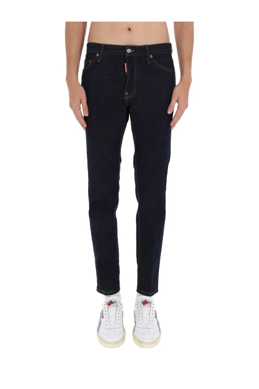 Dark blue slim fit denim jeans with white stitching and dsquared2 logo tag on the waistband for men