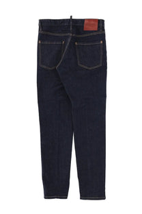 Dsquared2 men’s jeans teddy blue dark indigo denim with white stitching and brown leather patch on the waistband back view