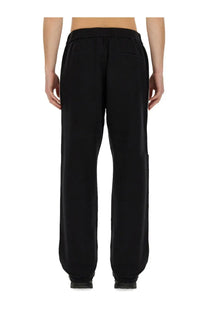 Dsquared2 men’s black jogging pants with a relaxed fit tapered design and elastic waistband for comfort