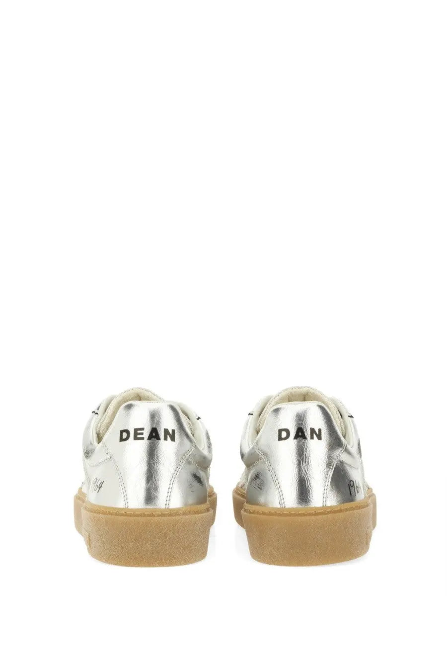 Back view of dsquared2 men’s silver leather sneakers with tan rubber sole and black lettering on the heel