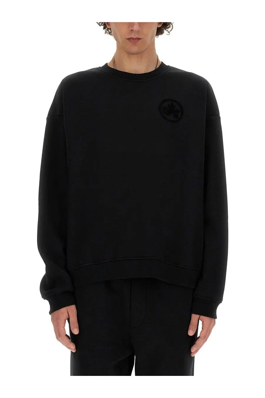 Dsquared2 men’s black oversized crewneck sweatshirt with subtle circular logo embroidered on left chest