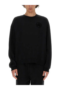 Dsquared2 men’s black oversized crewneck sweatshirt with subtle circular logo embroidered on left chest