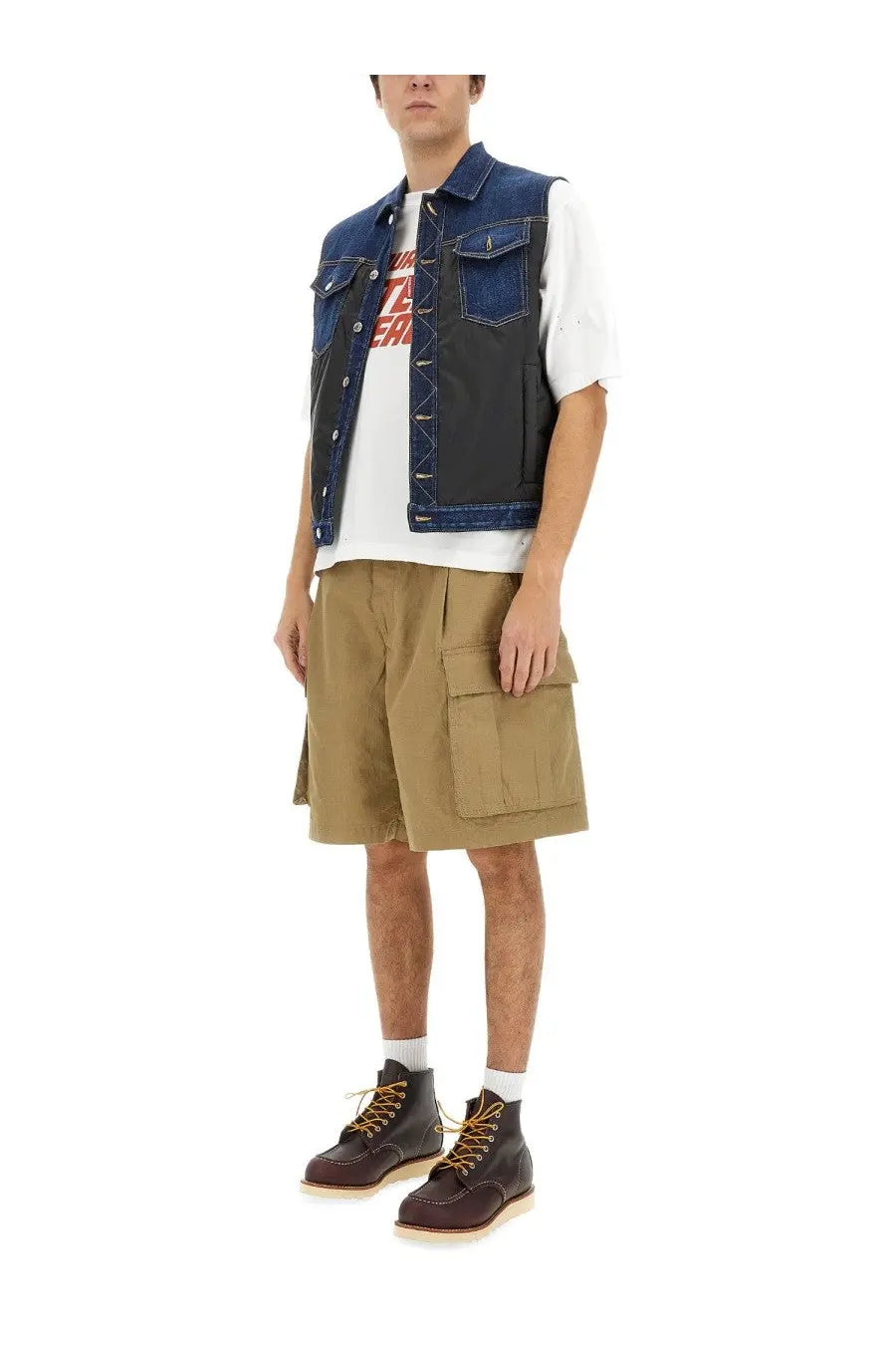 Blue denim vest with black paneling and silver toned buttons shown with dsquared2 men’s white shirt