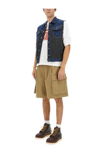 Blue denim vest with black paneling and silver toned buttons shown with dsquared2 men’s white shirt