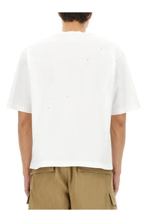 Dsquared2 men’s white short-sleeved t-shirt with subtle black speckle detailing in comfortable cotton fabric