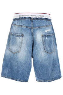 Dsquared2 men’s blue denim surfer shorts with a white elastic waistband featuring the dsquared2 logo in black lettering