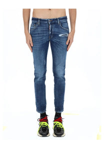 Dsquared2 men’s skater blue denim jeans with a distressed patch on the thigh and visible brand tag at the waistband
