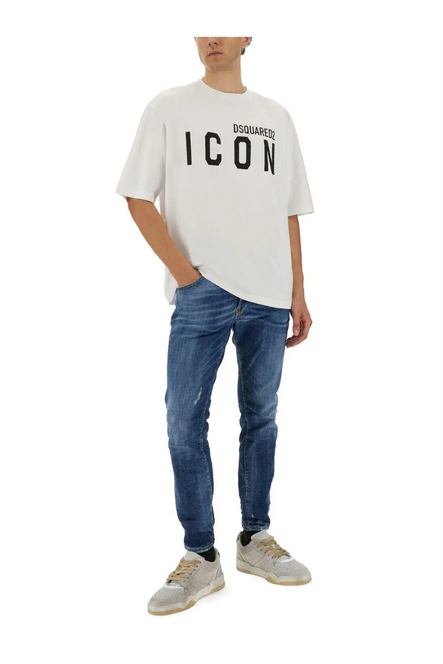 White dsquared2 icon graphic t-shirt with bold black lettering styled with blue men’s skater jeans
