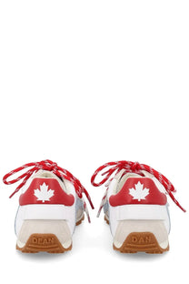 Back view of dsquared2 men’s white sneaker with red laces tan rubber soles and red maple leaf logo on heel
