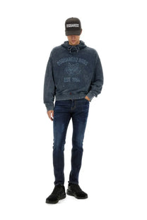 Dark blue distressed Dsquared2 men’s hoodie with faded logo and embroidered emblem in cotton blend fabric
