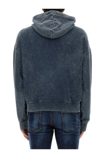 Dsquared2 men’s dark gray distressed hoodie with subtle white speckles and relaxed oversized fit