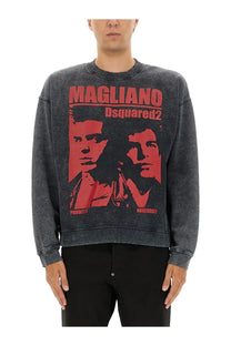 Dark gray distressed dsquared2 men’s sweatshirt with bold red graphic of two faces and magliano dsquared2 logo