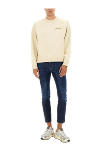 Cream-colored dsquared2 men’s sweatshirt with subtle gold embroidered logo on chest in soft cotton material