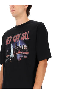 Dsquared2 men’s black cotton t-shirt with vibrant nighttime New York cityscape and bold red New York Doll lettering