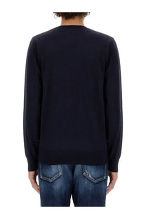 Navy blue knit wool jersey sweater for men by Dsquared2 with ribbed cuffs and hem