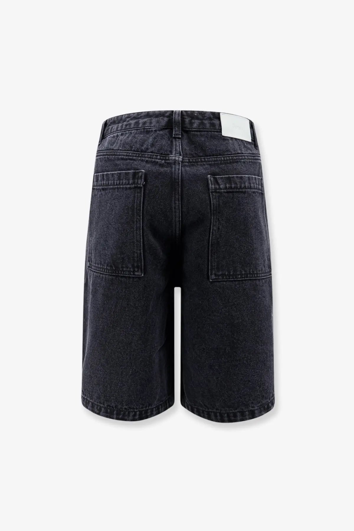 Back view of dunst men’s black dark-wash denim bermuda shorts with relaxed fit and two back pockets