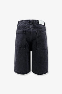 Back view of dunst men’s black dark-wash denim bermuda shorts with relaxed fit and two back pockets