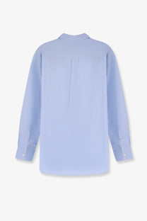 Light blue long-sleeved cotton button-down shirt with subtle back pleat and finished cuffs by DUNST men’s unisex