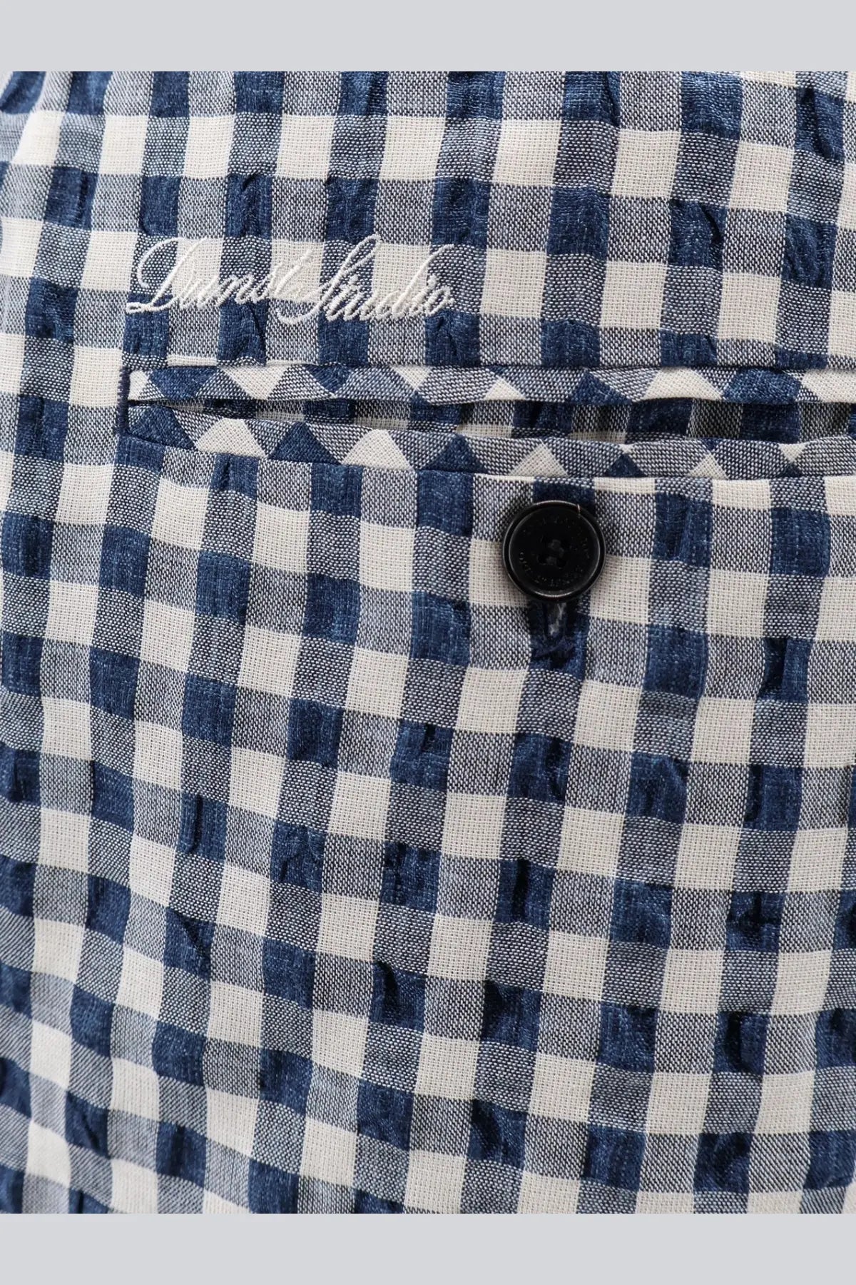 Dunst men’s unisex pyjamas trousers blue featuring a blue and white gingham check shirt with davide studio embroidery