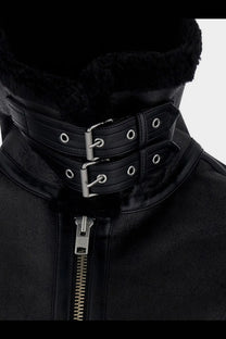 DUNST unisex eco shearling jacket black with black shearling lining, dual leather straps, and silver-toned buckles