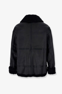 Black DUNST unisex eco shearling bomber jacket with plush fur collar cuffs hem and sleek matte finish