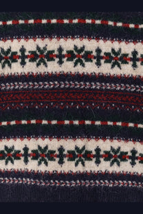 Dunst unisex fairisle sweater in blue with cozy knitted fabric and bold nordic cream navy red and green stripes