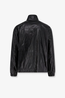 DUNST unisex vegan leather jacket in black with a high collar elastic cuffs and black matte-finish faux leather