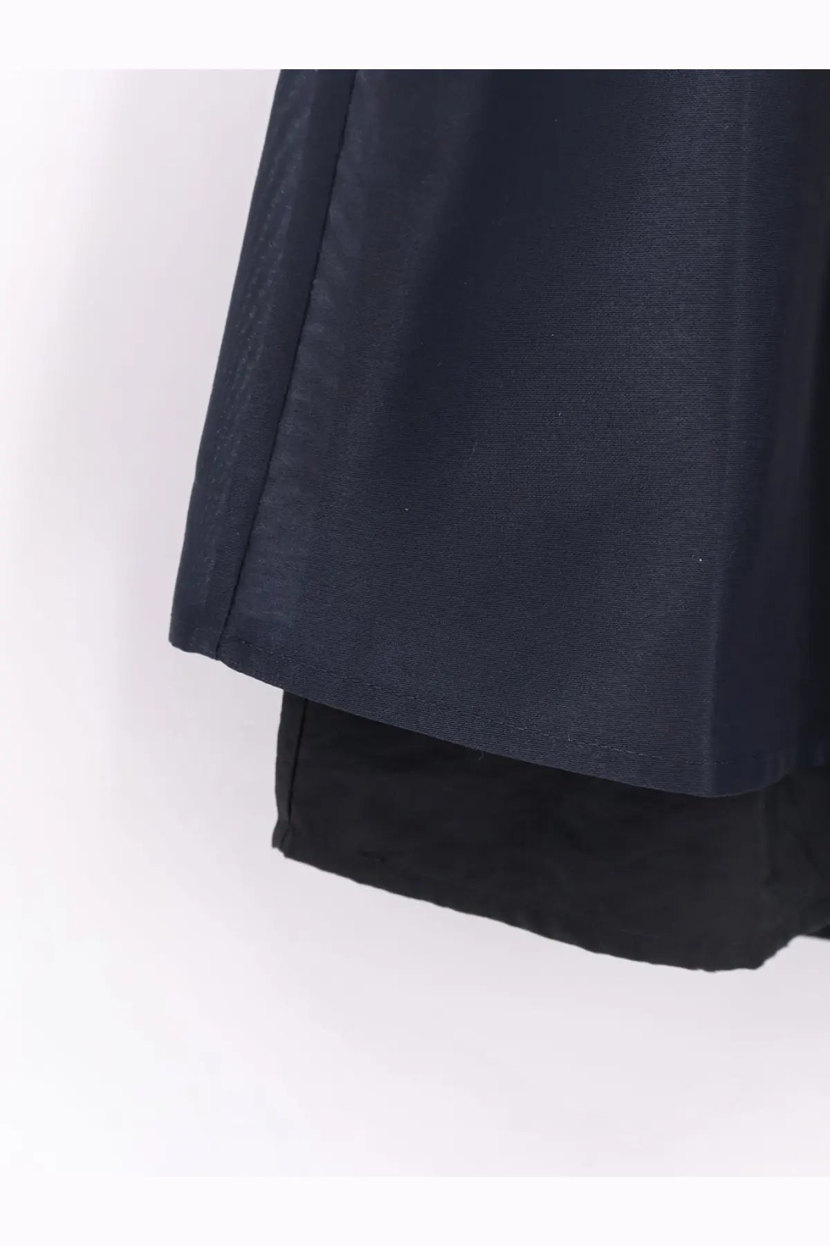 DUNST women’s layered volume mini skirt in dark navy textured fabric with subtle ribbed pattern and tailored hemline