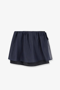 A navy blue dunst women’s layered volume mini skirt with sheer overlay and beaded trim along the waistband