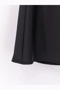 DUNST women’s black satin skirt with smooth flowing fabric and clean seam detailing