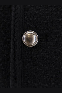 Silver button with twisted rope border and smooth center on dunst women’s unisex bouclé tweed blazer black