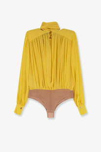 Elisabetta Franchi women’s yellow silk blouse with high neck and long sleeves over beige bodysuit