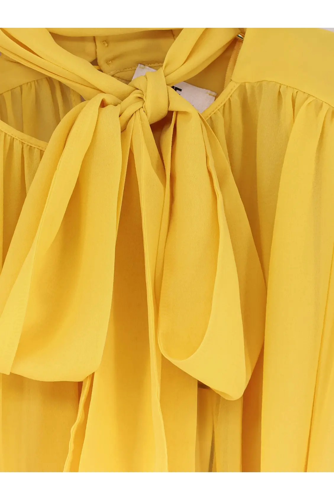 Elisabetta Franchi women’s yellow silk blouse with lightweight fabric and flowing tied bow at the neckline