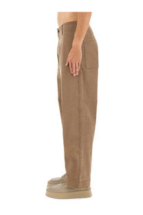 Emporio Armani men’s brown bull denim jeans with tan cotton chino relaxed fit and visible stitching details