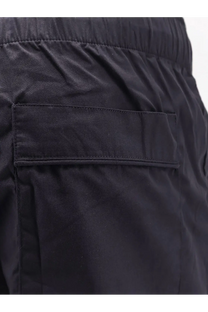 Entire Studios unisex black cotton bermuda shorts with drawstring waistband and a single rectangular patch pocket