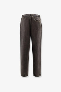 Entire studios unisex dark gray cotton jogging trousers shown from the back with elastic waistband and small pocket
