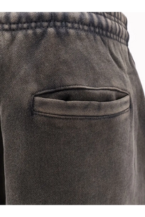 Entire studios unisex black cotton jogging trousers featuring dark gray soft-knit fabric with ribbed waistband and front pocket