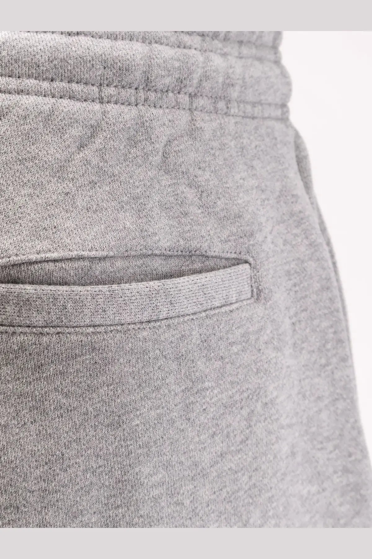 Entire Studios unisex grey cotton jogging trousers with soft heathered fabric and neatly stitched pocket detail