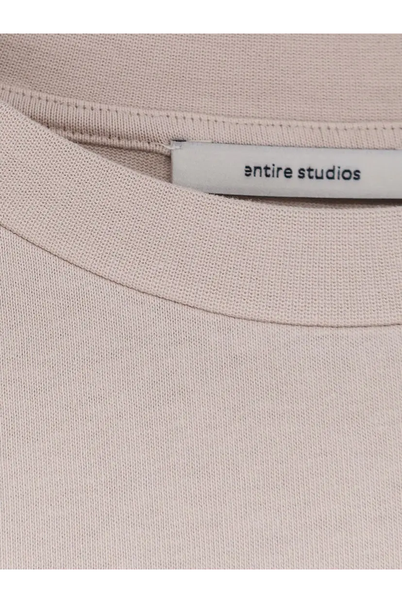 Beige cotton unisex heavy boxy tee with white entire studios label at the neckline