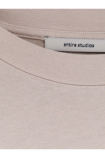 Beige cotton unisex heavy boxy tee with white entire studios label at the neckline