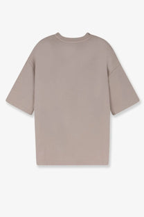 Entire Studios unisex heavy boxy tee in soft beige with oversized short sleeves and subtle seam detailing
