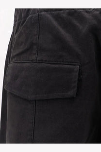 Entire studios unisex loft cotton trousers black showing black cargo pocket with durable fabric and reinforced stitching