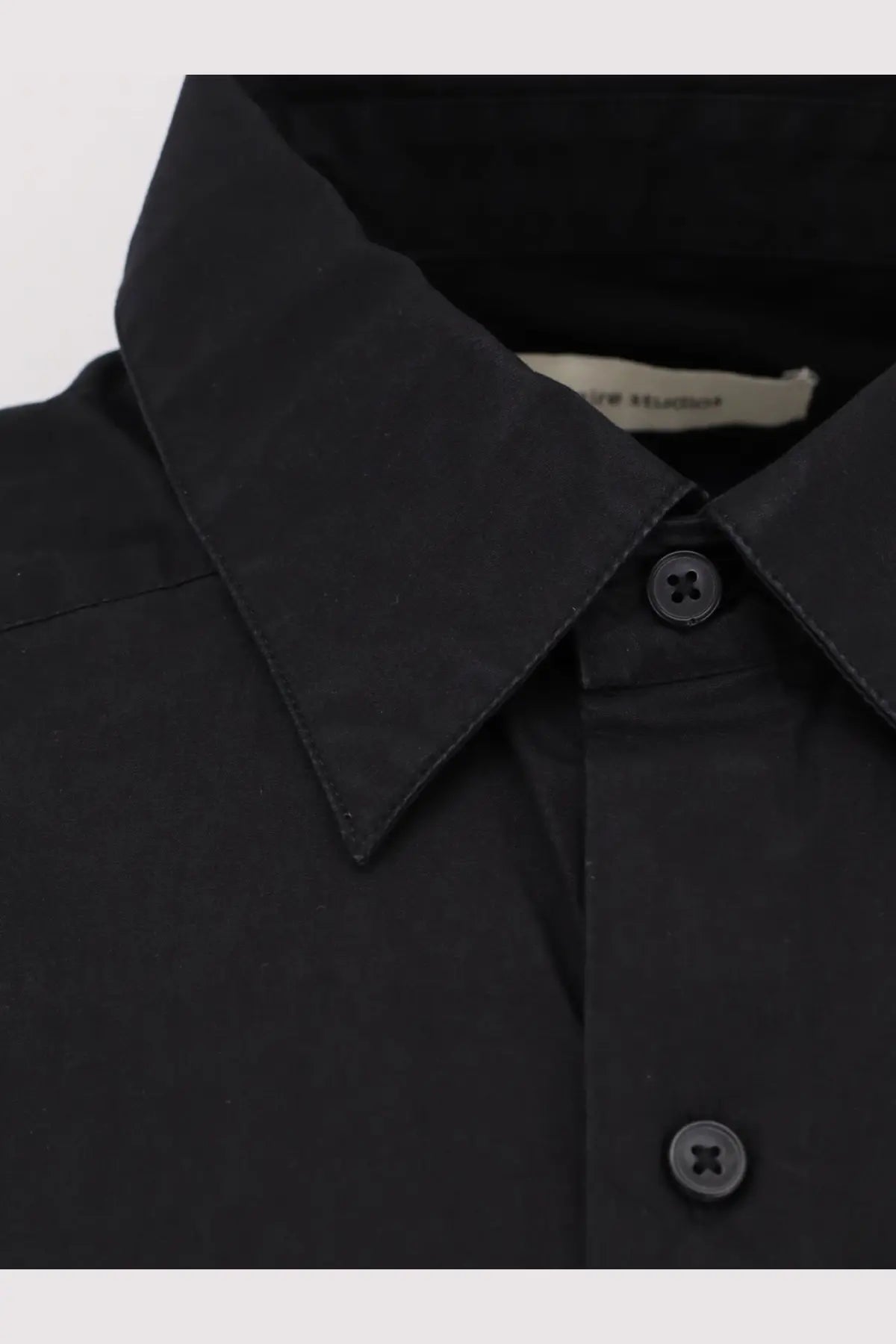 Entire studios unisex miller oversize black cotton shirt with a crisp collar and matching dark buttons