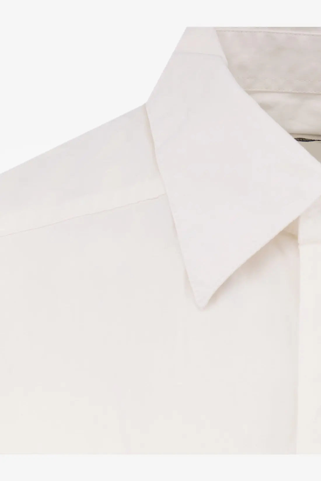 A crisp white cotton button-down collar with a clean tailored finish on entire studios unisex miller oversize shirt