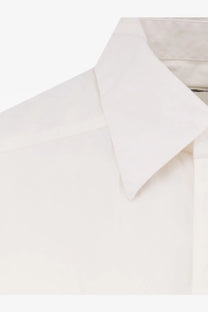 A crisp white cotton button-down collar with a clean tailored finish on entire studios unisex miller oversize shirt