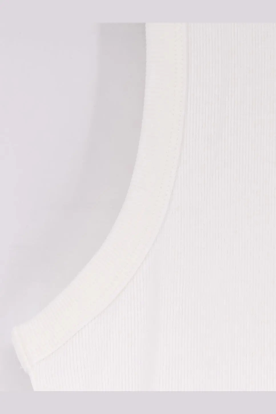White ribbed cotton tank top with curved neckline by Entire Studios for unisex comfortable wear