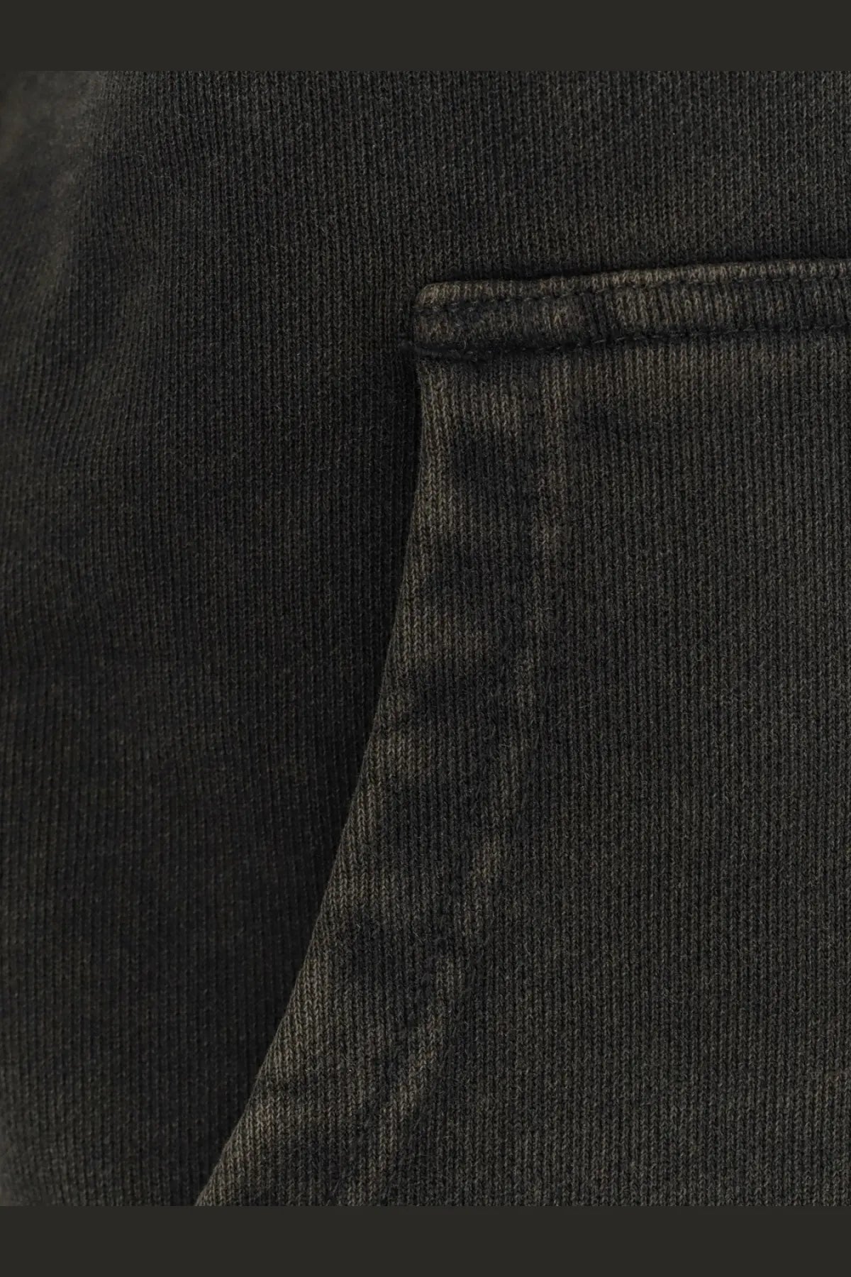 Entire studios unisex standard hood cotton sweatshirt black showing black ribbed knit fabric with stitched pocket detail