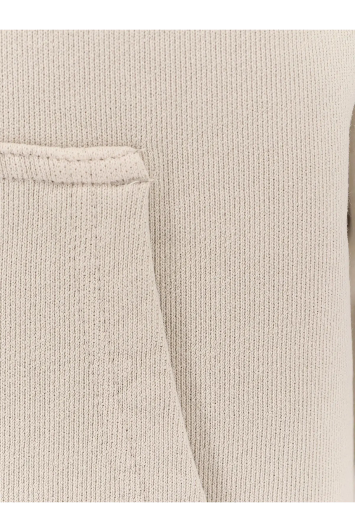 Beige ribbed knit fabric with a neatly stitched pocket on entire studios unisex standard hood cotton sweatshirt white