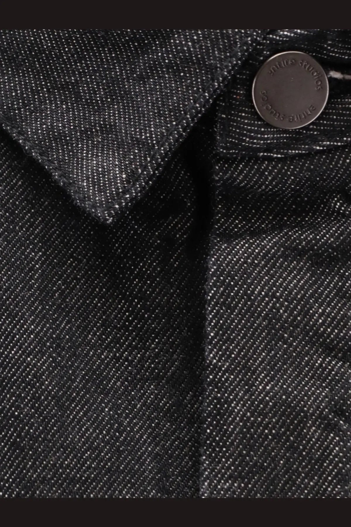 Entire studios women’s black denim shirt jacket featuring a circular metal button engraved with acne studios
